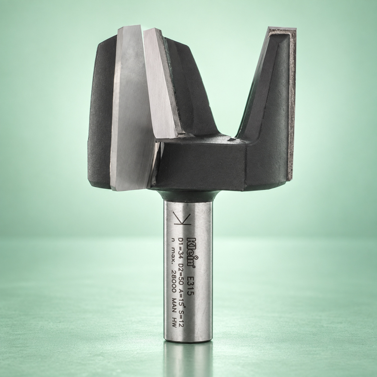 Klein Sistemi wide-profile HW bevel-hole router bit on a mint green reflective stage