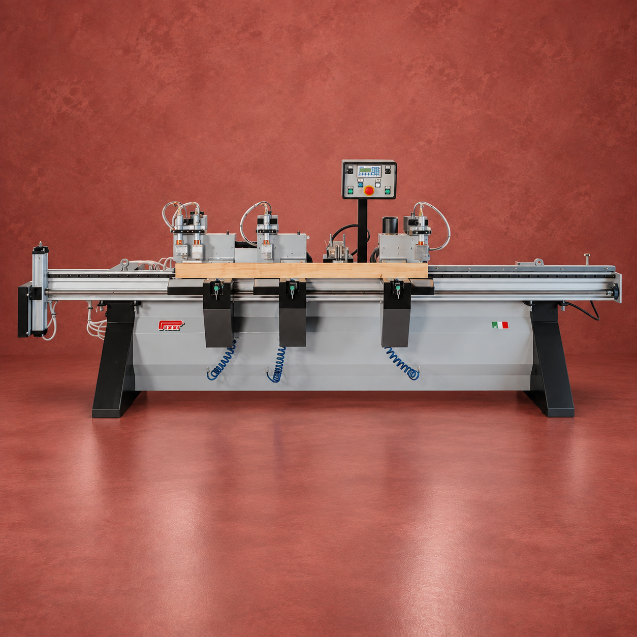 Pizzi horizontal processing line with multiple pneumatic stations on a muted red studio background